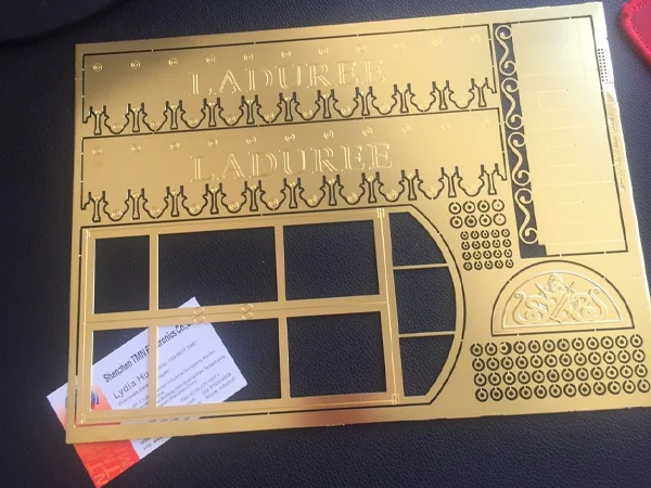 This is a customized brass photo-etched model part sample based on the drawings provided by the customer