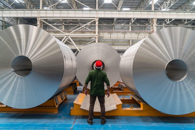 A man looking at Sheet Metal Fabrication for Industrial Use
