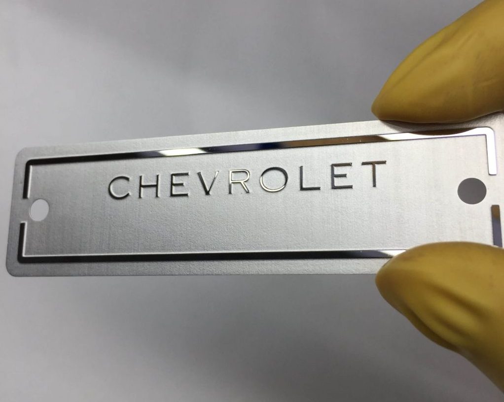 metal logo plate