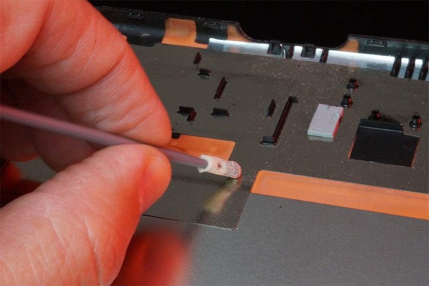 Applying conductive coatings on electronic parts